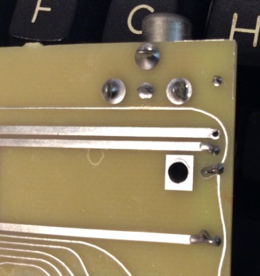 Jupiter ACE composite video circuit - bottom of board showing the track cut