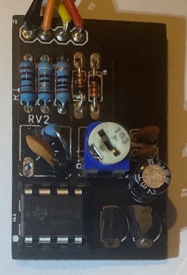 The board with a real TI NE555P fitted